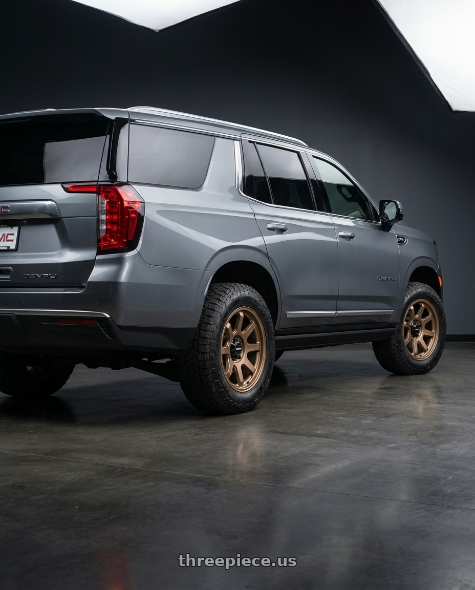 2021 GMC Yukon Denali with Vision Off-Road 351 Flow 6x139.7 17x9+20 Bronze wheels rear three quarter view square tires