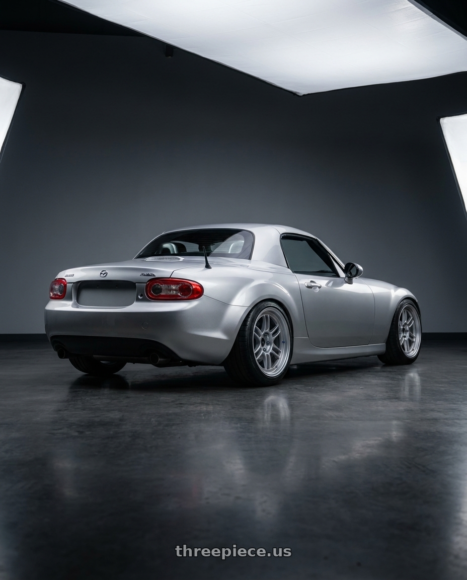 2007 Mazda Miata with Enkei RPF1RS 5x114.3 18x11-10 Silver wheels rear three quarter view slight stretch tires