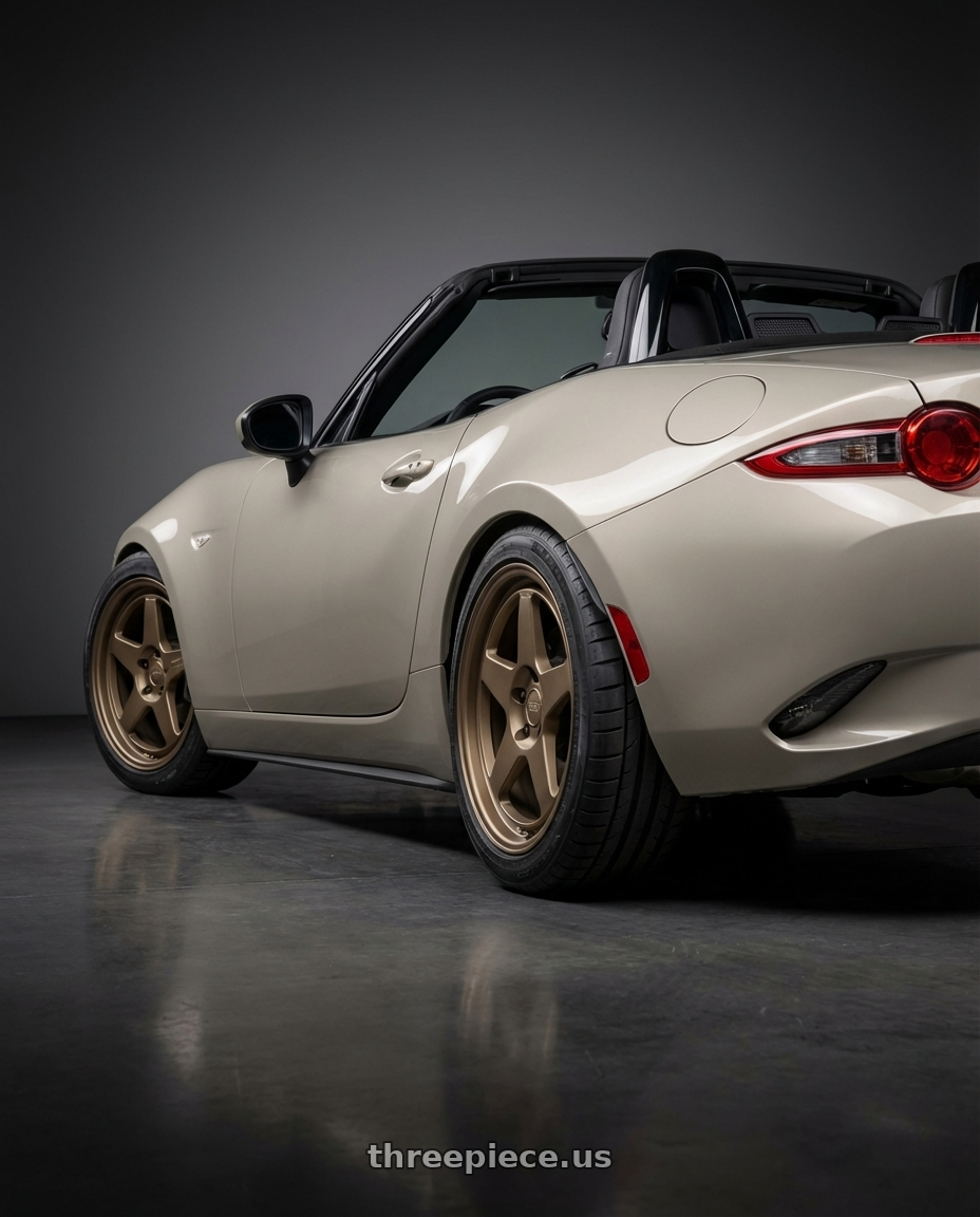 2021 Mazda MX-5 Miata ND with Kansei K12B KNP 5x114.3 17x9 22 Bronze wheels rear three quarter view square tires