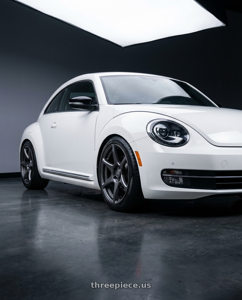 2016 Volkswagen Beetle Turbo with Kansei K11G Tandem 5X112 18x8.5 35 Gunmetal wheels front three quarter view lowered stance
