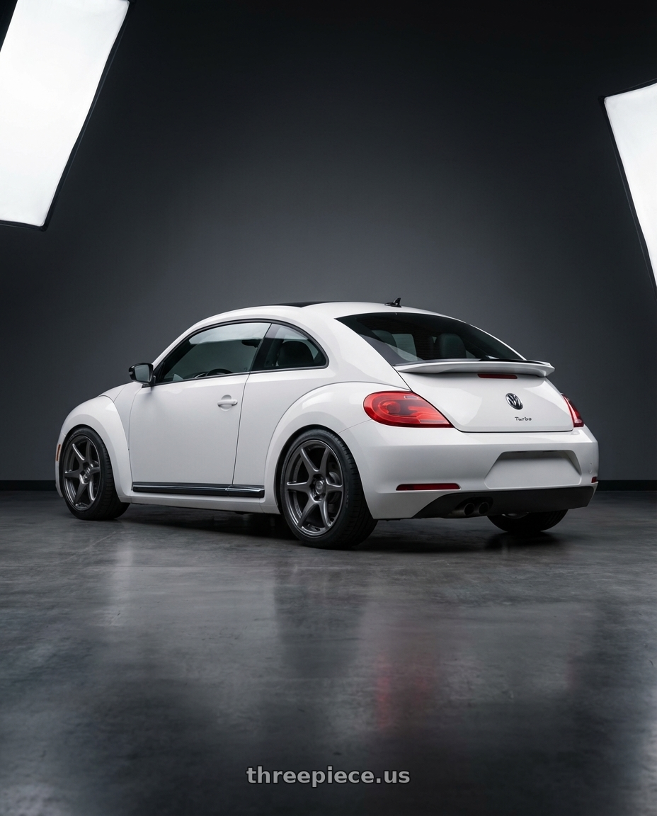 2016 Volkswagen Beetle Turbo with Kansei K11G Tandem 5X112 18x8.5 35 Gunmetal wheels rear three quarter view square tires