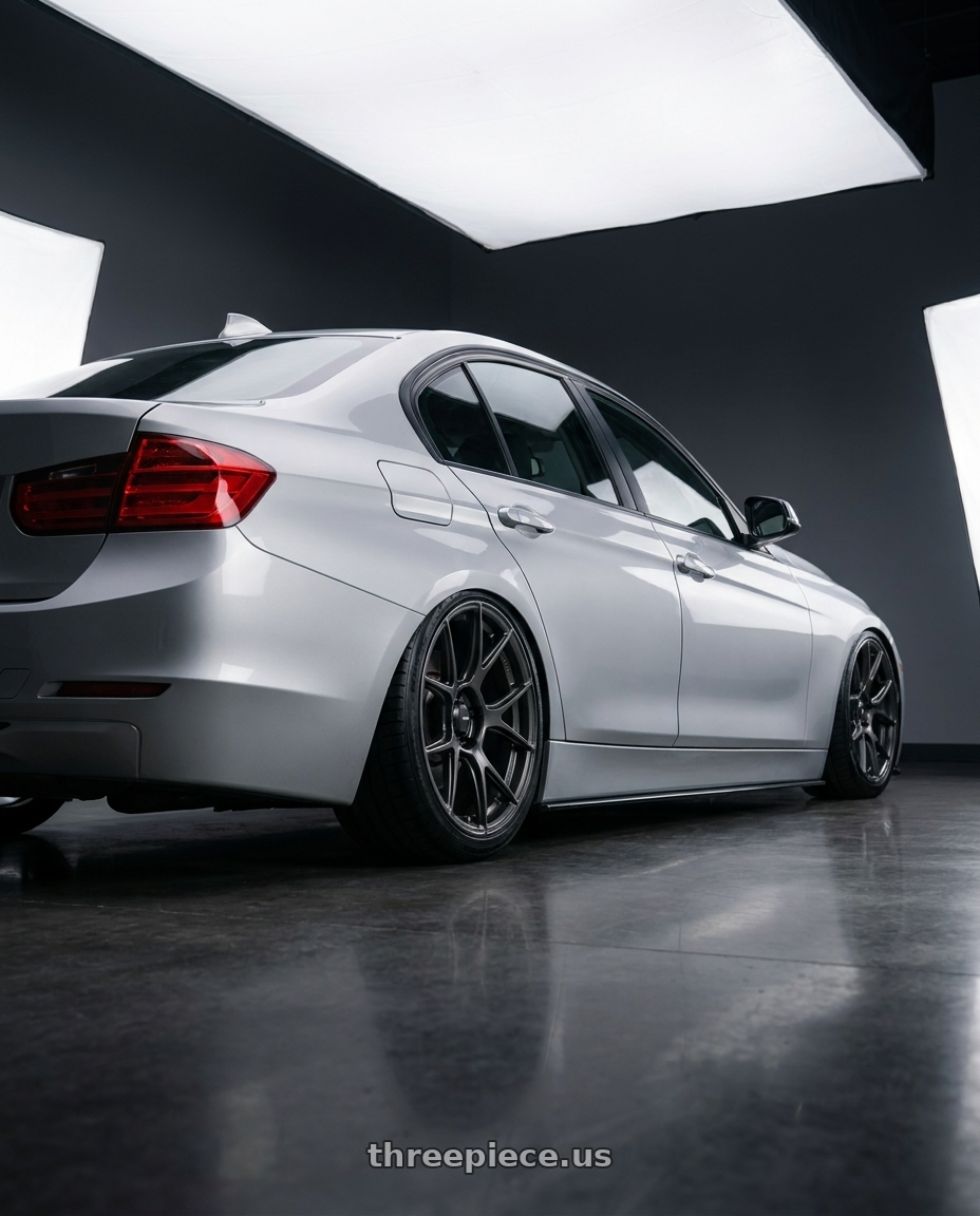 2015 Bmw F30 with Konig Ampliform 5x120 19x8.5+32 Dark Metallic Graphite wheels rear three quarter view slight stretch tires
