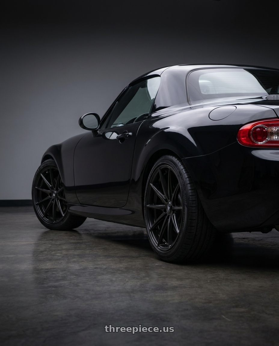 2013 Mazda miata PRHT Grand with Konig Oversteer 5x114.3 17x8+45 Gloss Black wheels rear three quarter view slight stretch tires