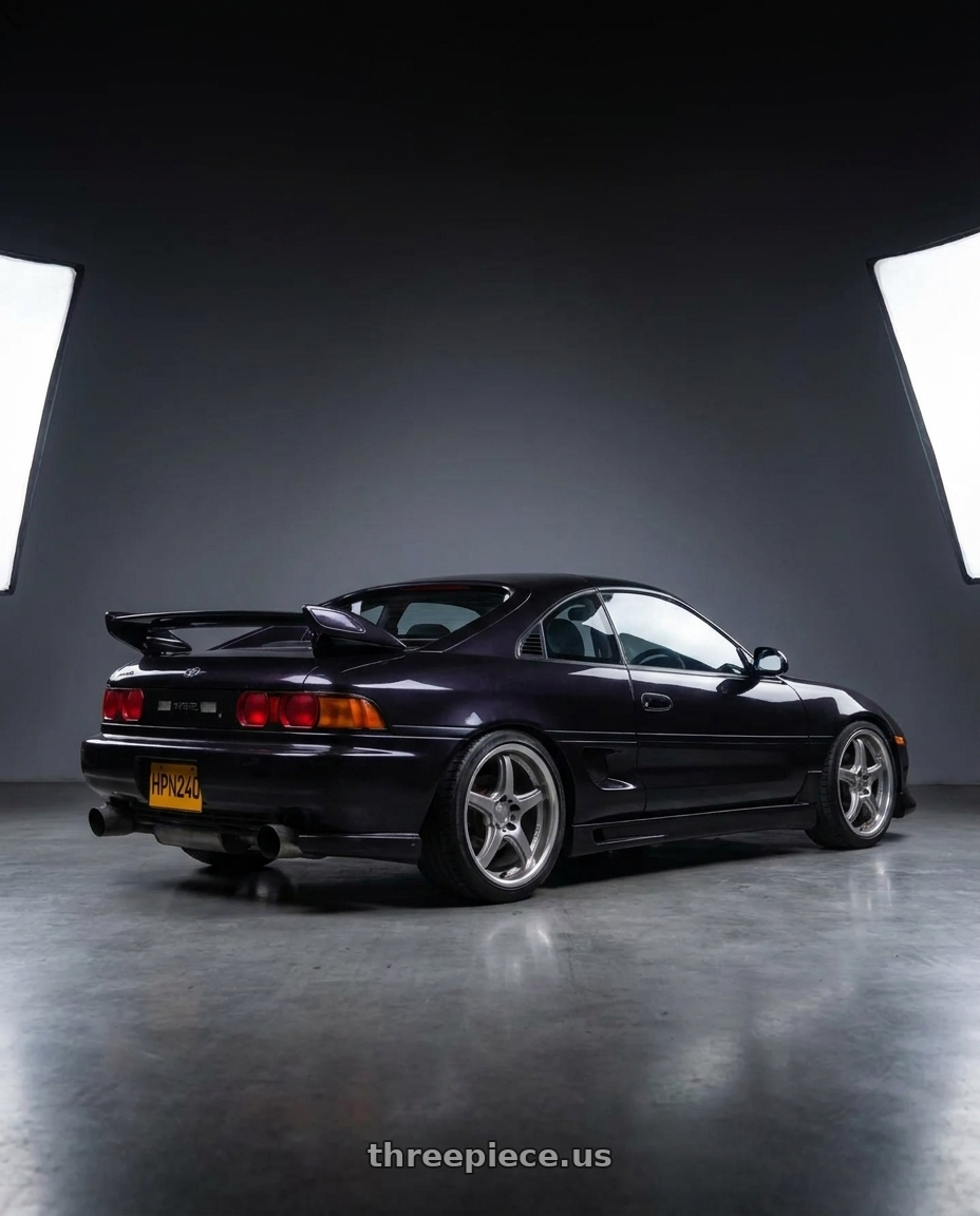 1998 Toyota MR2 with Work Emotion T5r 5x114.3 18x8.5 +35 Glow Silver wheels rear three quarter view slight stretch tires