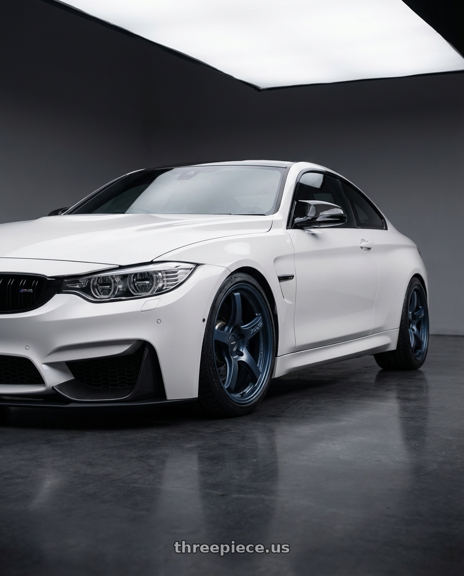 2018 BMW M4 F82 with Gram Lights 57CR 5x120 19x9.5+25 Gunblue II wheels front three quarter view lowered stance