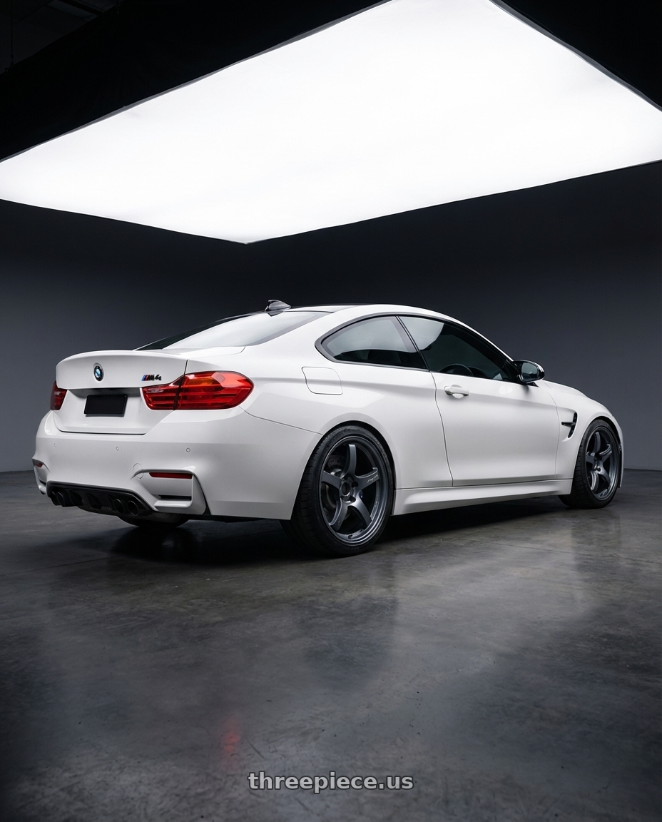 2018 BMW M4 F82 with Gram Lights 57CR 5x120 19x9.5+25 Gunblue II wheels rear three quarter view square tires