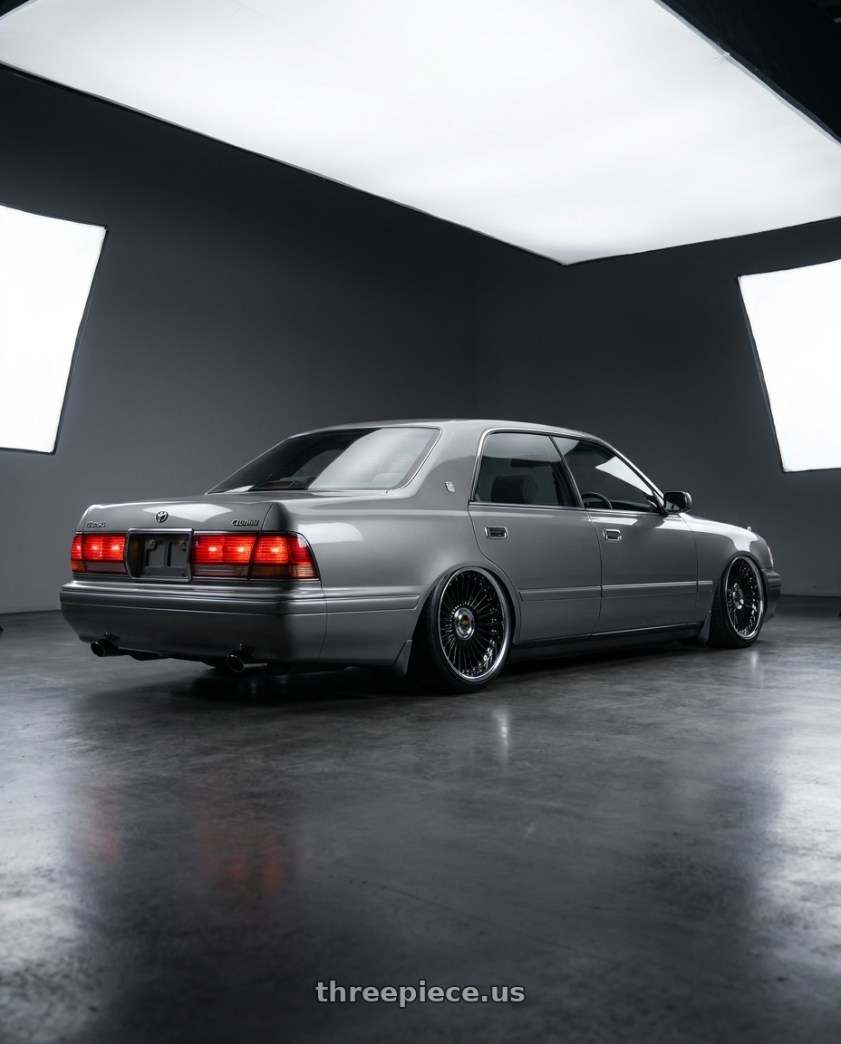 1991 Toyota crown with Work Emitz Black Polish 5x100 19x7.5 +45 wheels rear three quarter view slight stretch tires