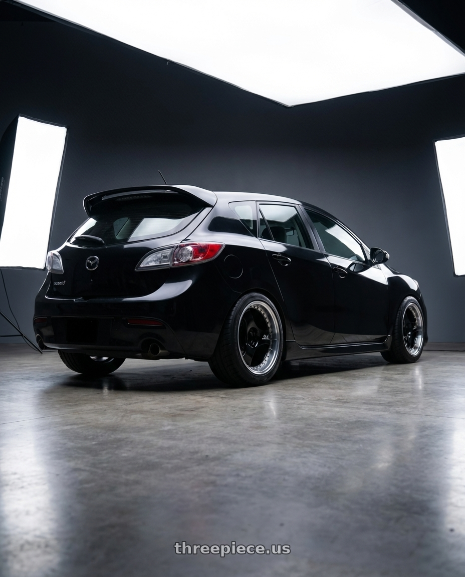 black 2010 mazdaspeed3  with Advan Racing ONI2 PROGRESSIVE 5x114.3 20x9.0 +30 MACHINING & RACING GLOSS BLACK wheels rear three quarter view meaty tires