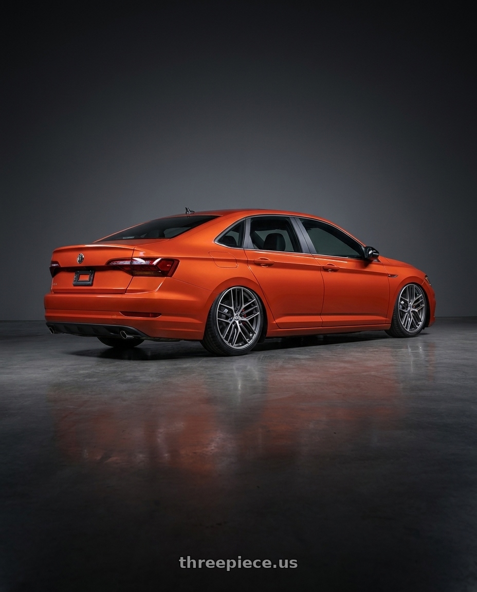 2023 Volkswagen Jetta GLI MK7 with BBS CC-R 5x112 19x9.5+42 Graphite w/ Diamond Cut Face wheels rear three quarter view slight stretch tires