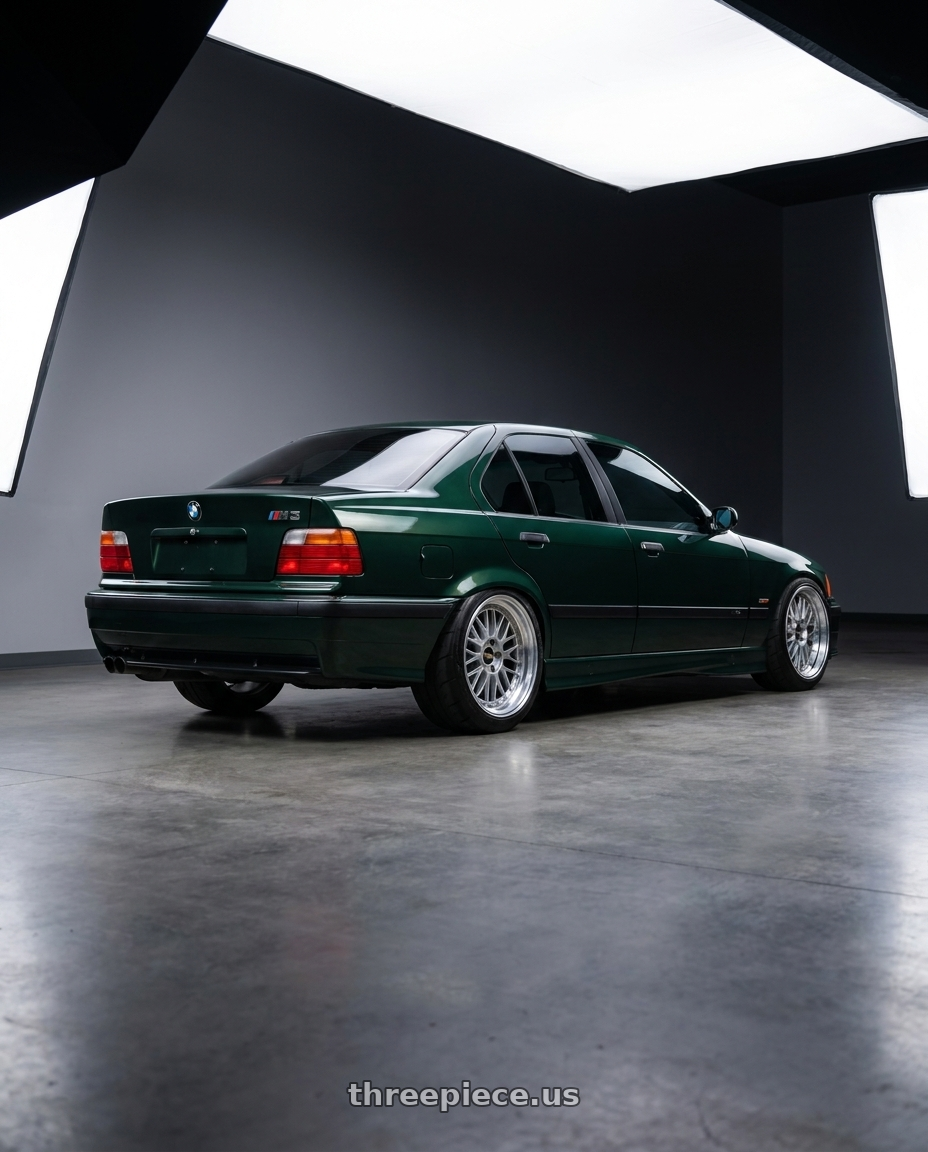 1997 bmw m3 with BBS LM 5x120 17x8.5+18 Diamond Silver wheels rear three quarter view meaty tires