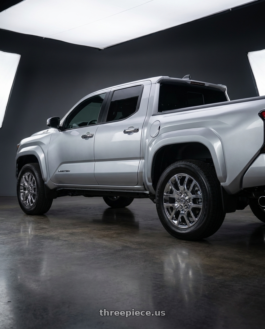 2024 Toyota Tacoma with Performance Replicas PR169 6X139.7 20X9 +27 CHROME wheels rear three quarter view square tires