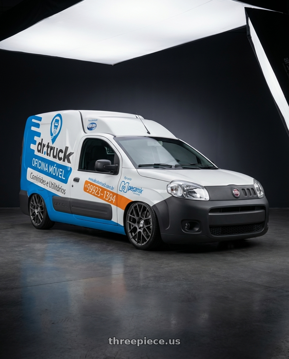 fiat fiorino 2020 adesivada with TSW NURBURGRING 5X114.3 17X7.5 +45 MATTE GUNMETAL wheels front three quarter view slammed stance