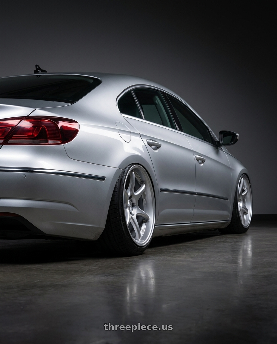2015 Volkswagen CC with Kansei K11S Tandem 5X112 19x10.5 22 Hyper Silver wheels rear three quarter view slight stretch tires