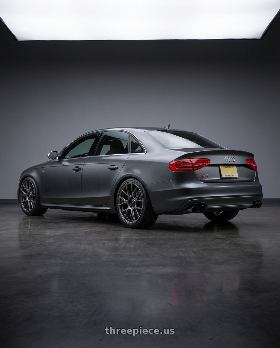 2015 Audi S4 B8.5 with Konig Ampliform 5x112 19x8.5+32 Dark Metallic Graphite wheels rear three quarter view square tires