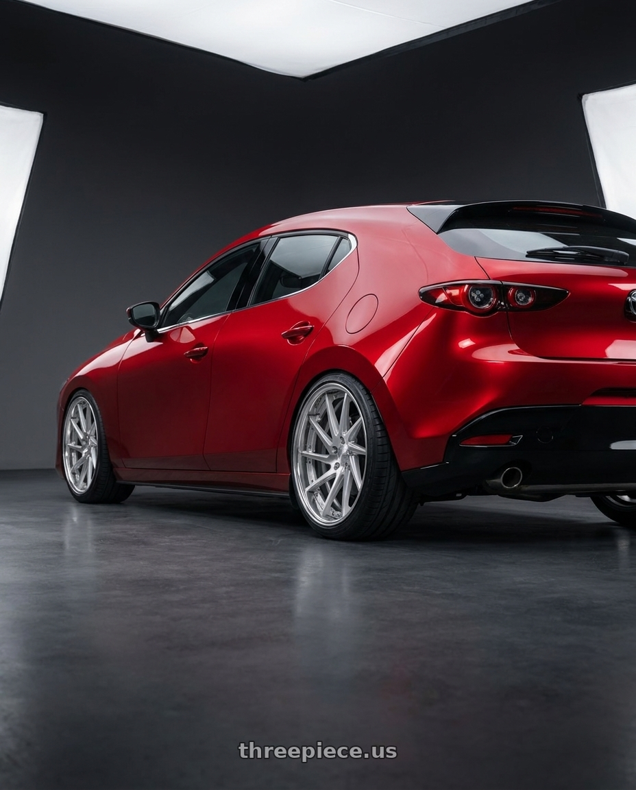 2025 Mazda 3 with Work Gnosis Cvs 5x114.3 19x8.5+30 O Disk Brush Silver Clear wheels rear three quarter view square tires