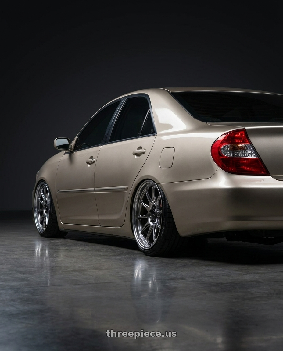 2003 Toyota Camry  with Konig Countergram 5x120 18x8.5+35 Hyper Chrome / Machined Lip wheels rear three quarter view square tires