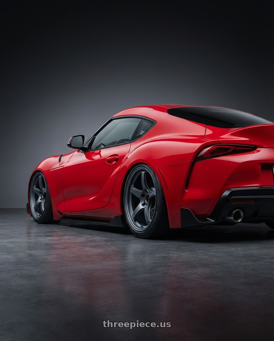 2023 Toyota GR Supra with Gram Lights 57CR 5x112 19x10.5+22 Gunblue II wheels rear three quarter view slight stretch tires