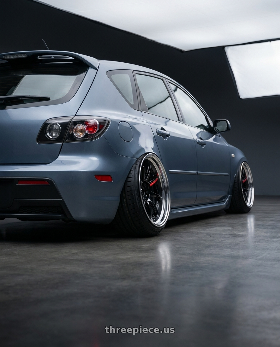 2007 mazda mazdaspeed3 with Emotion ZR10 2P wheels rear three quarter view slight stretch tires