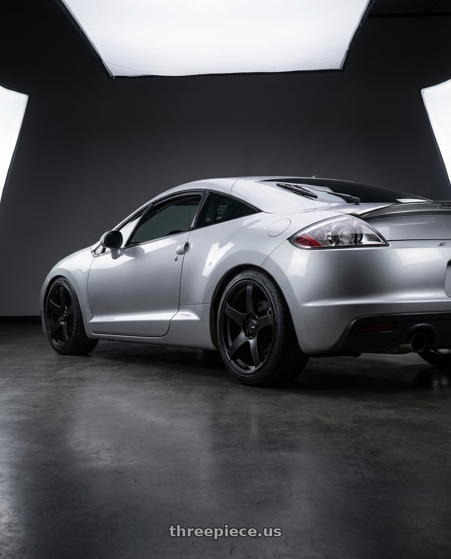 2010 Mitsubishi Eclipse with Ssr Gtv01 5x114.3 18x9+35  FLAT BLACK wheels rear three quarter view square tires