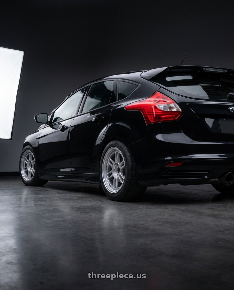 2012 ford focus st black with Enkei RPF1 5x114.3 17x7+45 Silver wheels rear three quarter view meaty tires