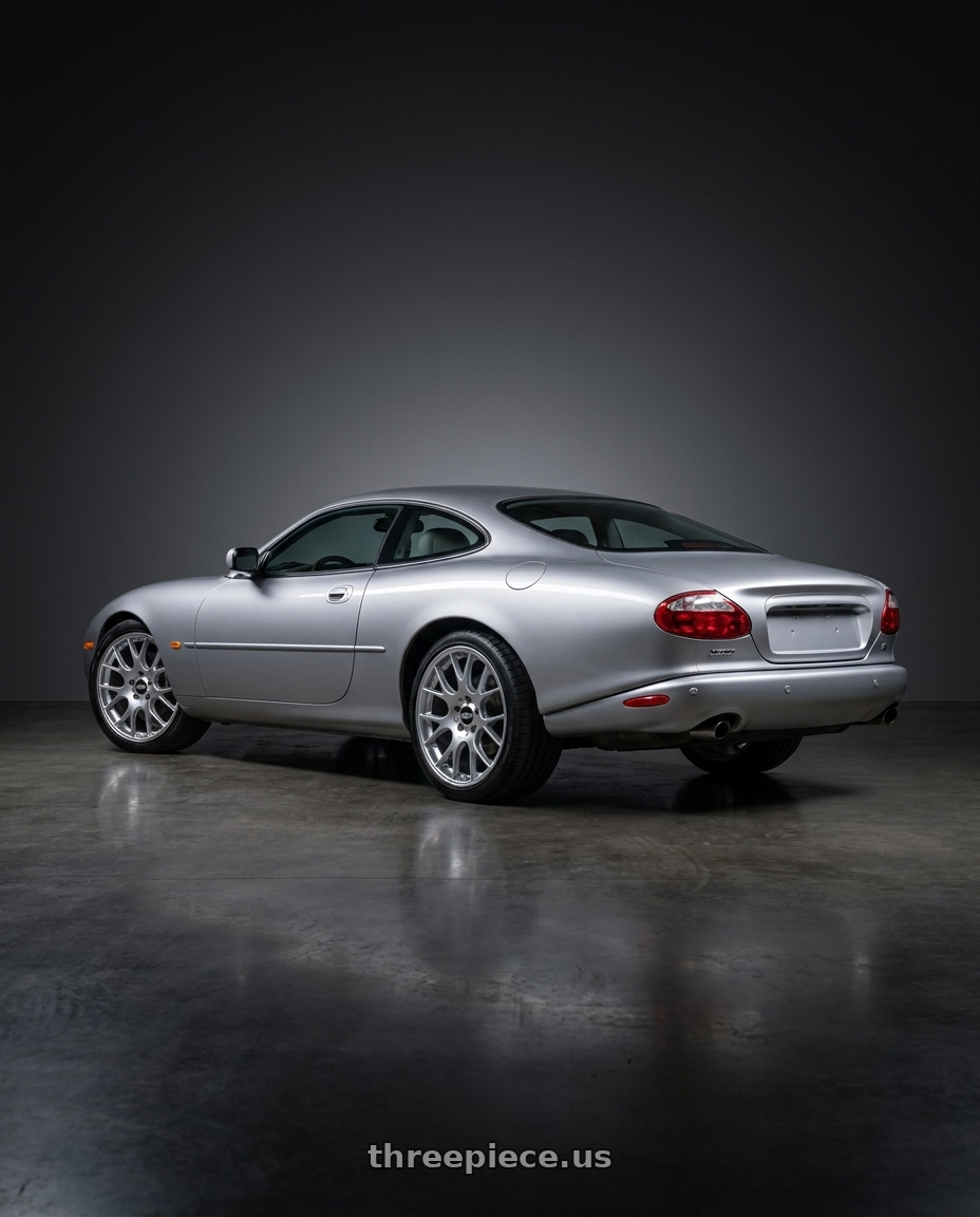 2002 Jaguar XK8 with BBS CH-R 5x115 20x9 +24 Diamond Silver Polished Rim Protector wheels rear three quarter view square tires