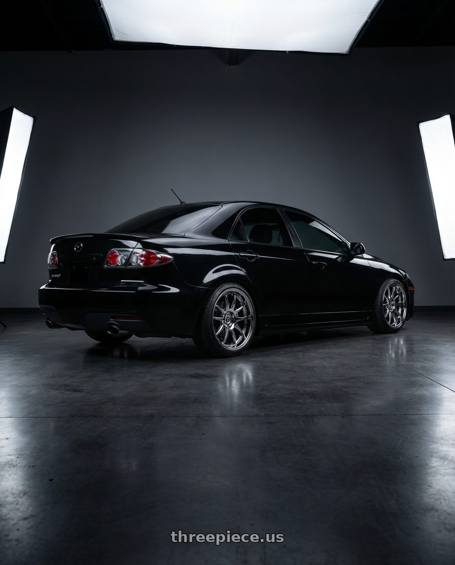 2006 Mazda, Mazdaspeed 6, Grand touring, Black with Aodhan DS02 5x114.3 18x9.5+15 Vacuum Chrome wheels rear three quarter view square tires