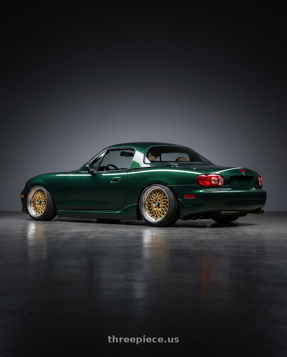 2000 Mazda Miata with SSR Formula MESH 4X100 16X9+26 SL Disk Fm Gold wheels rear three quarter view slight stretch tires