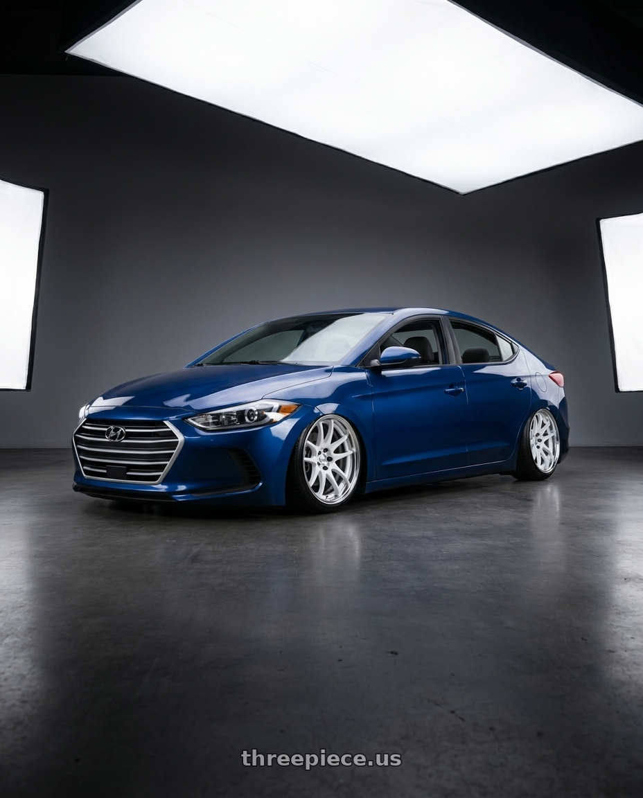 2017 Hyundai elantra with Work Cr 2P 4x100 17x8.0 +45 Gloss White wheels