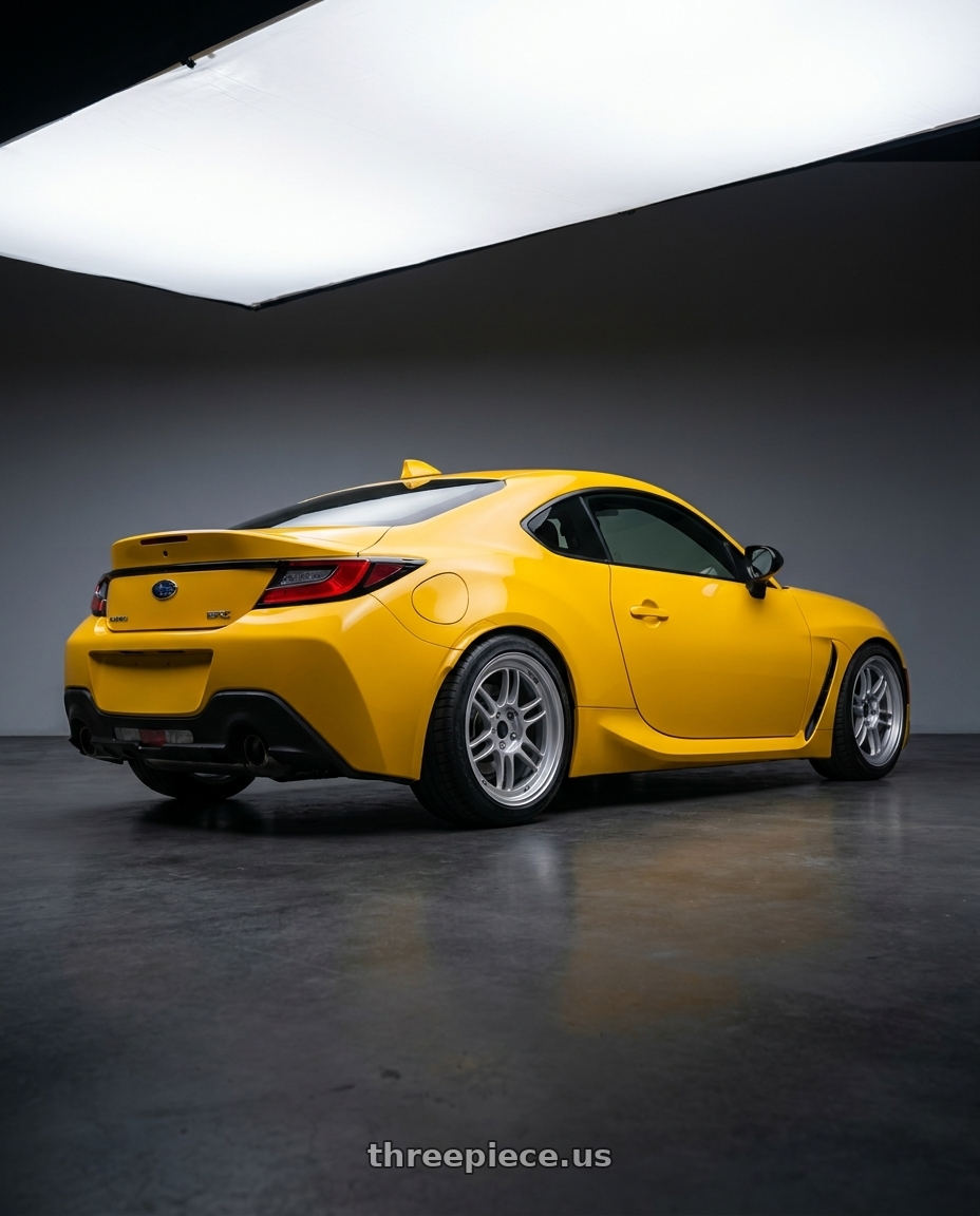 2026 Subaru BRZ Series.Yellow with Enkei RPF1 5x100 18x8+35 Silver wheels rear three quarter view square tires
