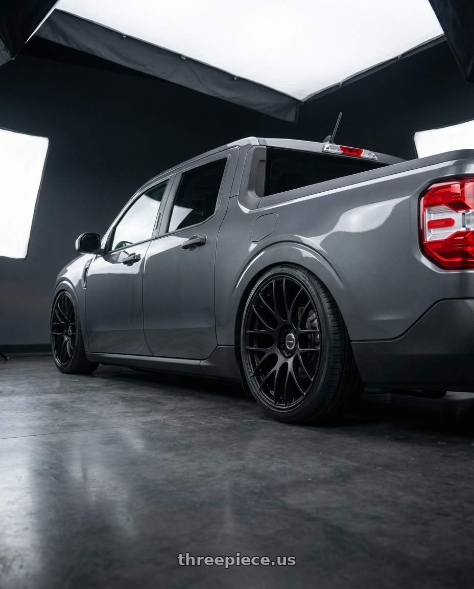 2026 ford maverick with Work Emotion m8r 5x108 19x9.5 +38 Matte Black wheels rear three quarter view slight stretch tires