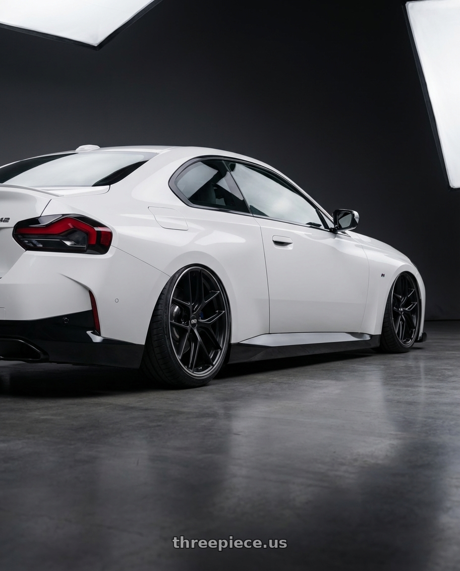 2024 BMW 2 Series G42 with BBS CC-R 5x112 19x9.5+46 Satin Black wheels rear three quarter view slight stretch tires