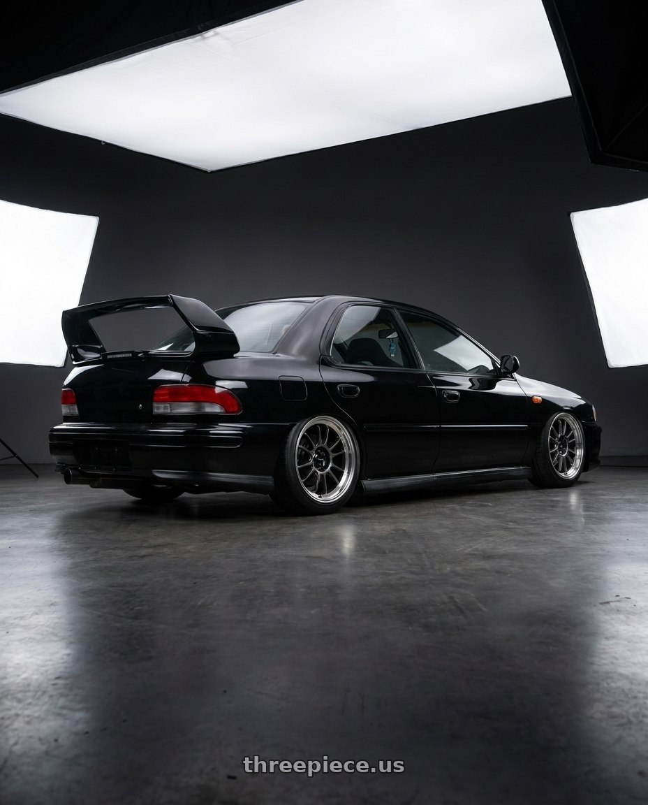 1998 Subaru Impreza GC8 with Konig Hypergram 5x100 17x9+40 Metallic Carbon w/ Machined Lip wheels rear three quarter view slight stretch tires