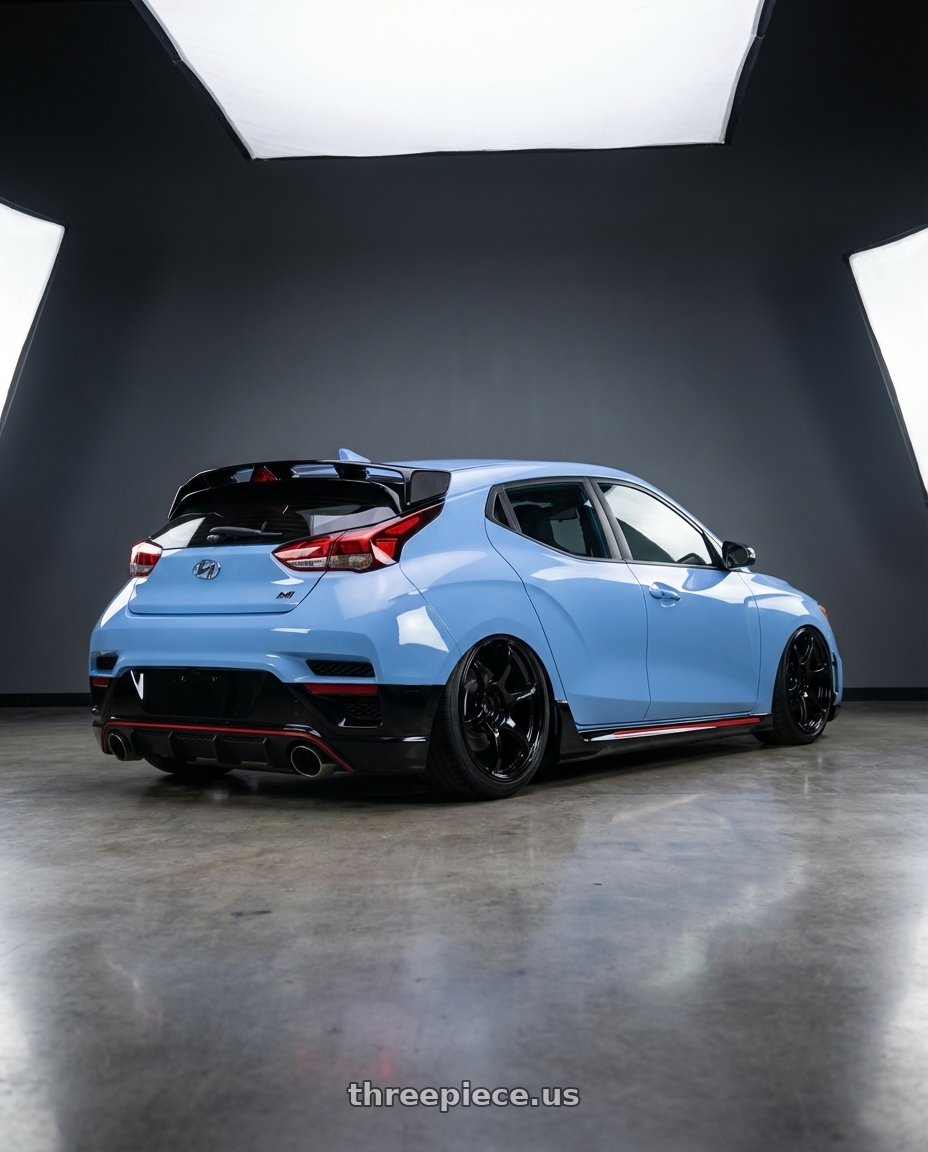 2022 Hyundai Veloster N with Advan RGIII 5x114.3 19x9.0+25 Gloss Black wheels rear three quarter view slight stretch tires