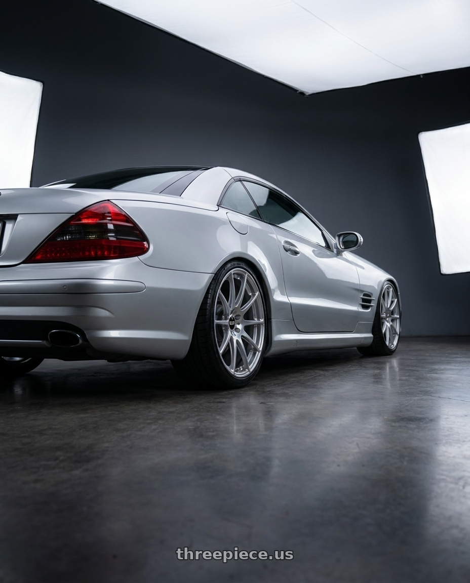 2006 Mercedes SL500 with BBS FS 5x112 19x10 +38 PFS Diamond Silver wheels rear three quarter view slight stretch tires