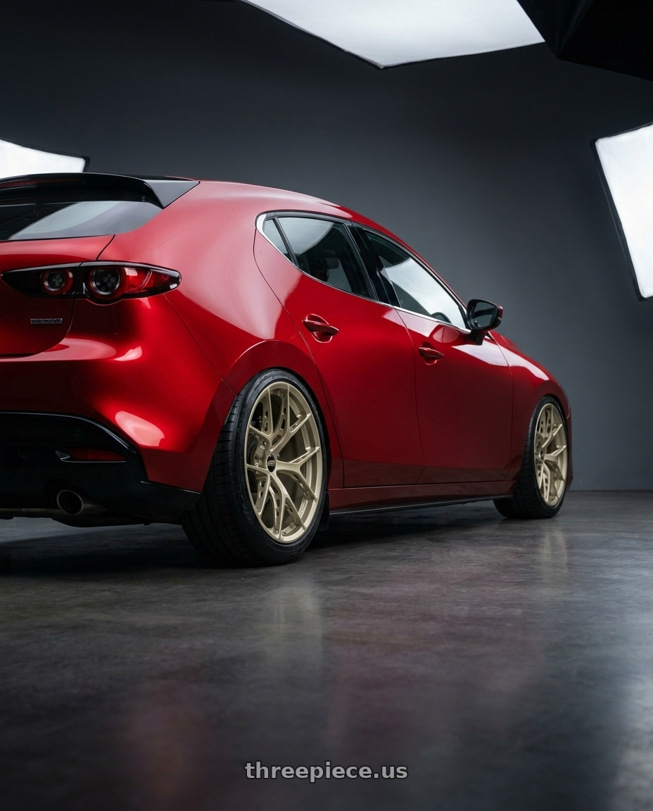 2024 Mazda 3 with BBS FI-R Evo 5x112 20x10.5+15 White Gold wheels rear three quarter view slight stretch tires