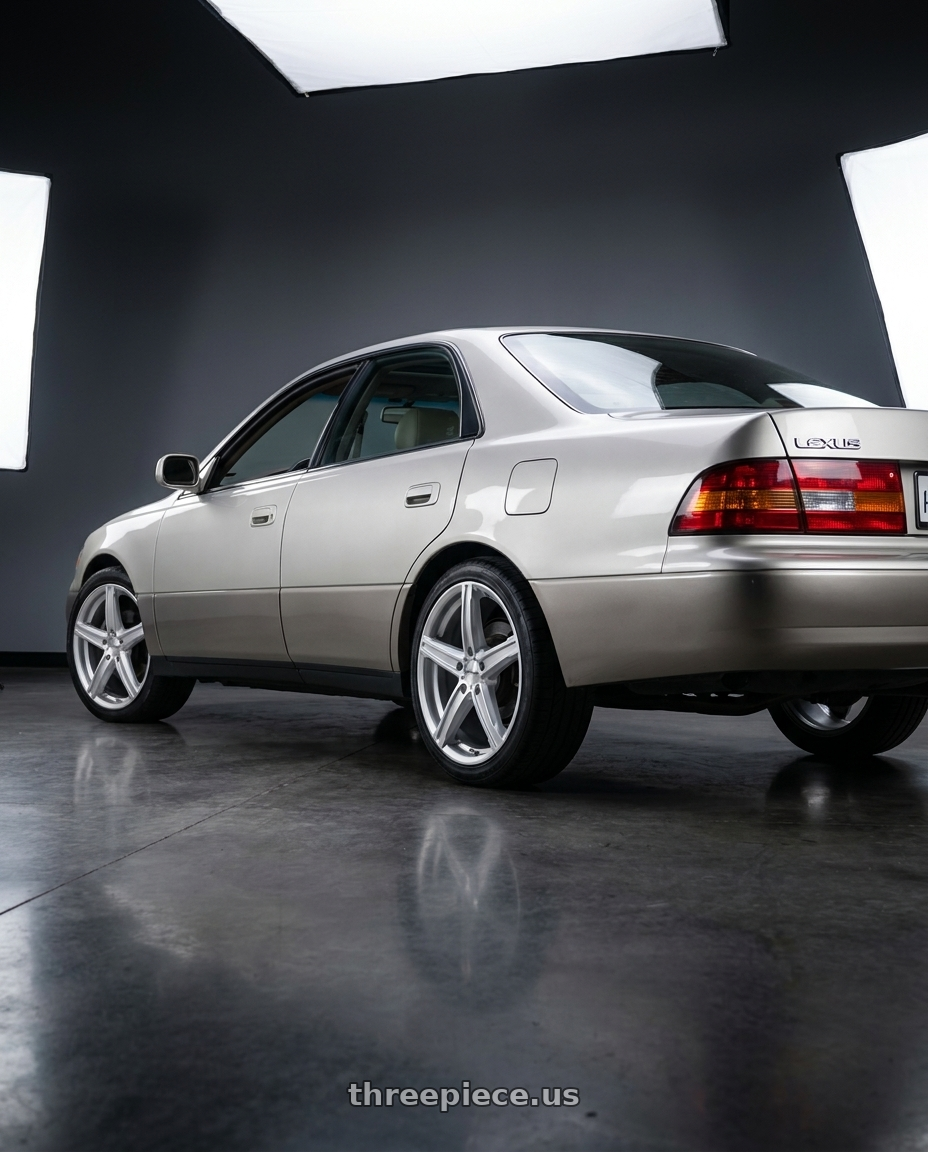 1998 Lexus es300 with Vision Street-Designs 469 Boost 5x114.3 16x7+38 Silver wheels rear three quarter view square tires