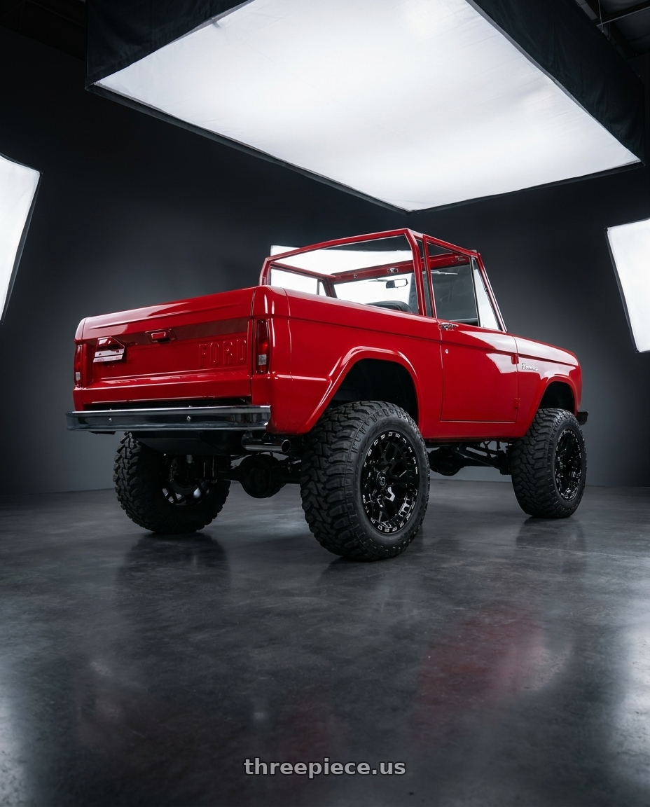 1972 ford bronco with TIS UTV 558BML 4X156 15x7 +38 Gloss Black w/Milled Lip Logo wheels rear three quarter view meaty tires