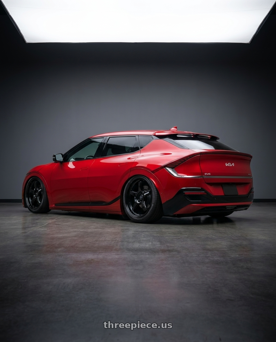 2022 Kia Ev6 with WedsSport RN-05M 5x114.3 19x9.5+48 Gloss Black wheels rear three quarter view slight stretch tires