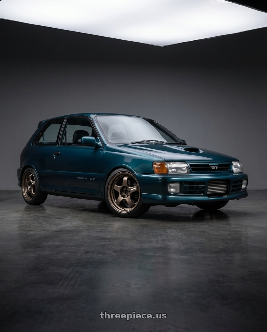 1990 Toyota Starlet GT with Work Meister S1R 4x100 16x7.5+45 A Disk Ashdot Titanium wheels
