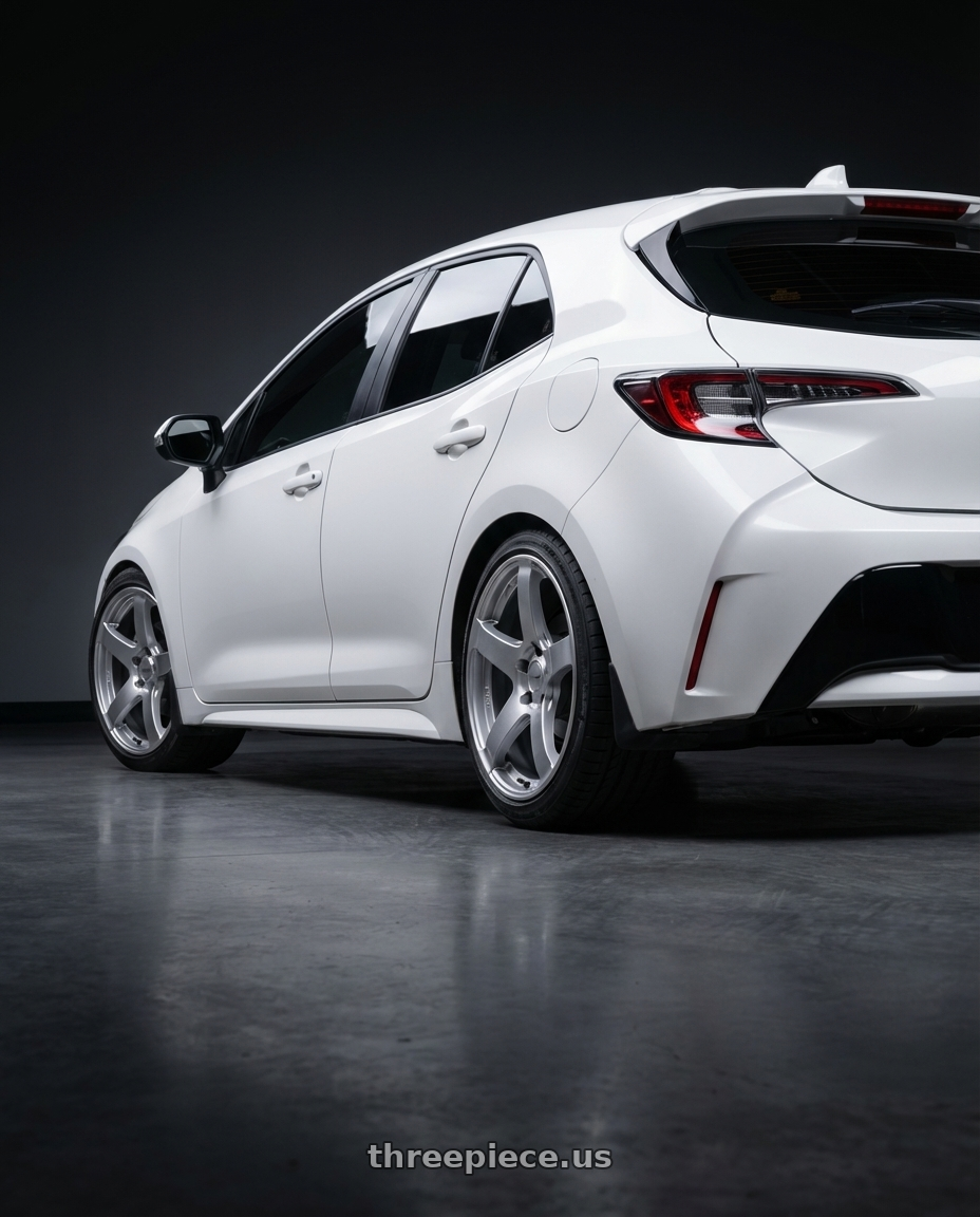 2023 Toyota Corolla Hatchback with Ssr Gtv01 5x114.3 18x10.5+15  GLARE SILVER wheels rear three quarter view square tires