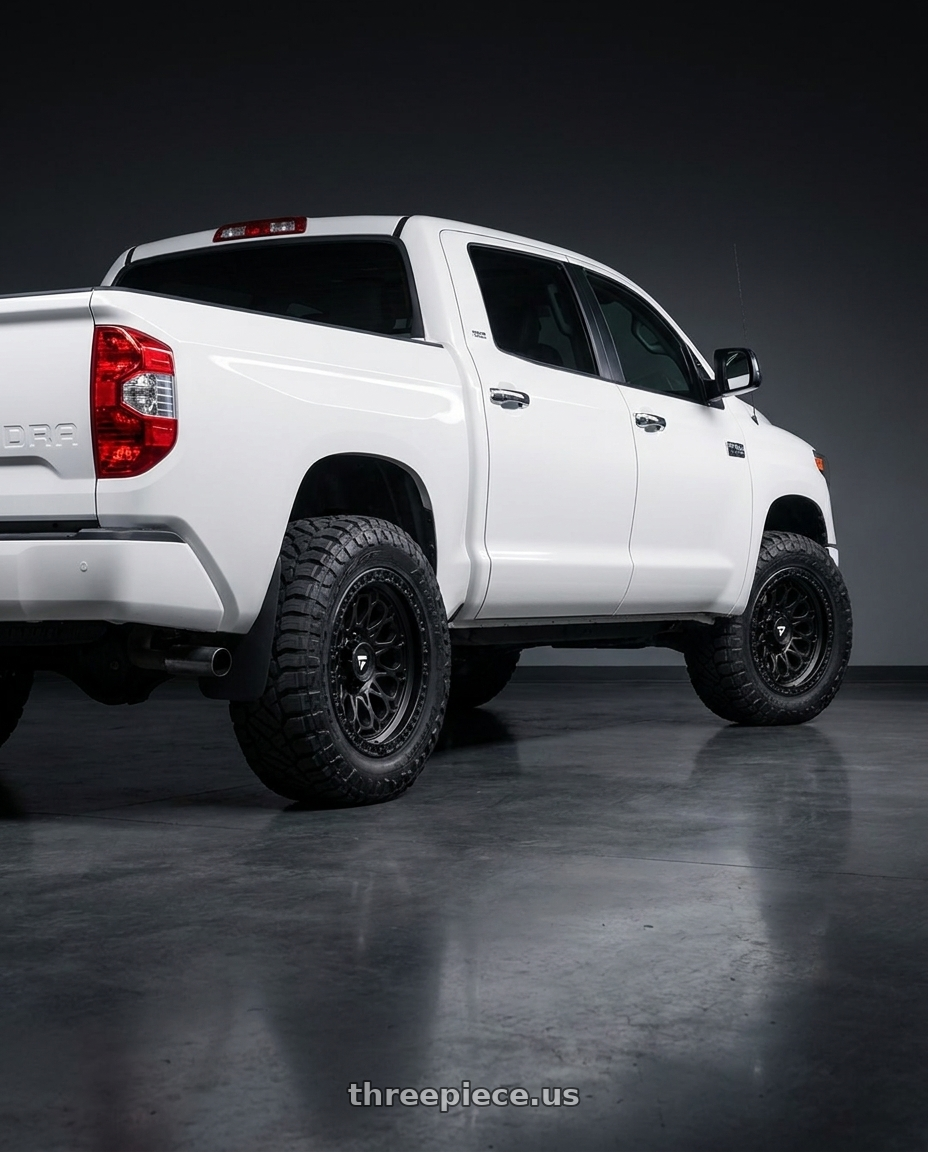 2016 toyota tundra platinum with Fittipaldi Offroad FT101SB 5x150 20x9 +18 Satin Black wheels rear three quarter view meaty tires