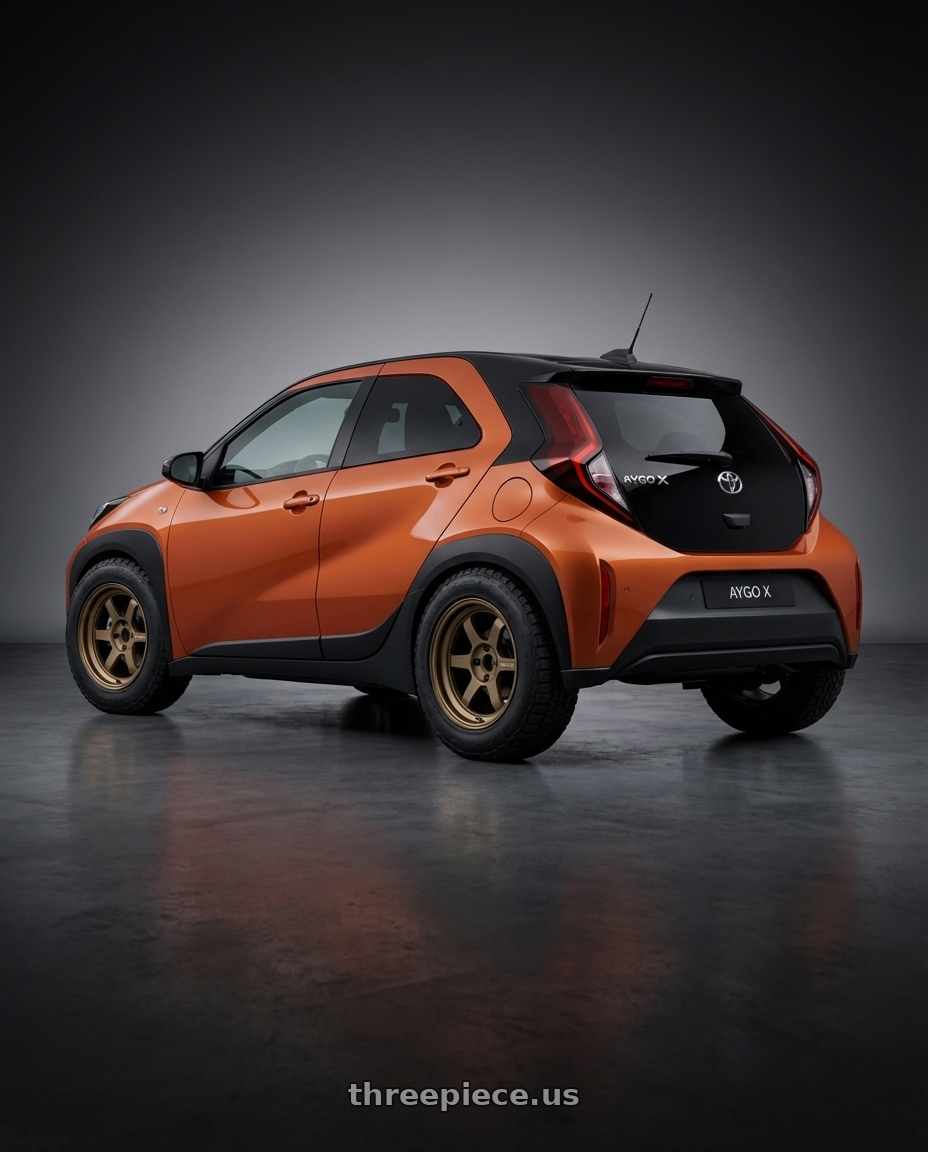 2025 Toyota Aygo X Hybrid with Volk Racing TE37V 4x100 15x8.0+25 wheels rear three quarter view meaty tires