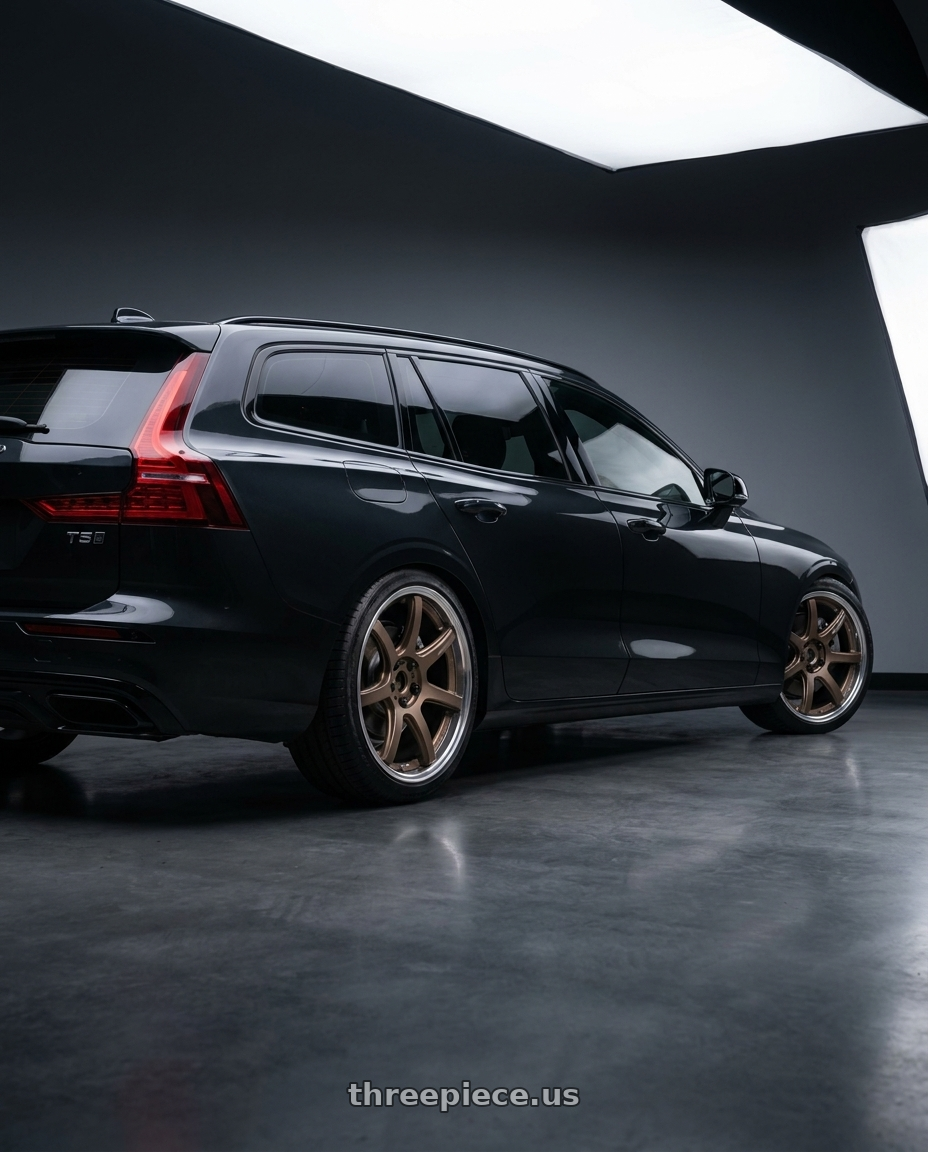 2020 Volvo v60 t5 r with Work T7r 2P 5x108 20x8.5 +38 Matte Bronze wheels rear three quarter view square tires