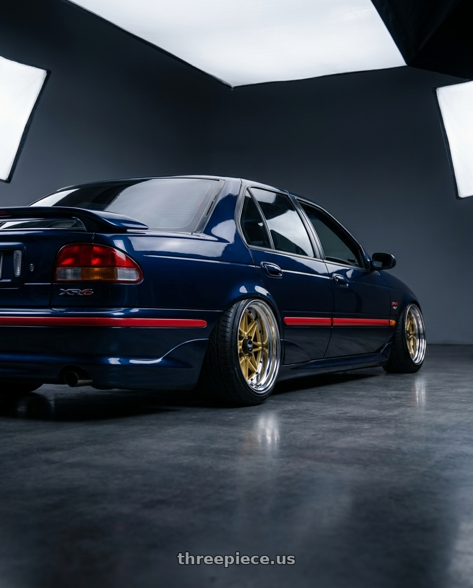 1997 Ford falcon with WORK Equip 03 4x100 15x12 -28 GOLD wheels rear three quarter view meaty tires