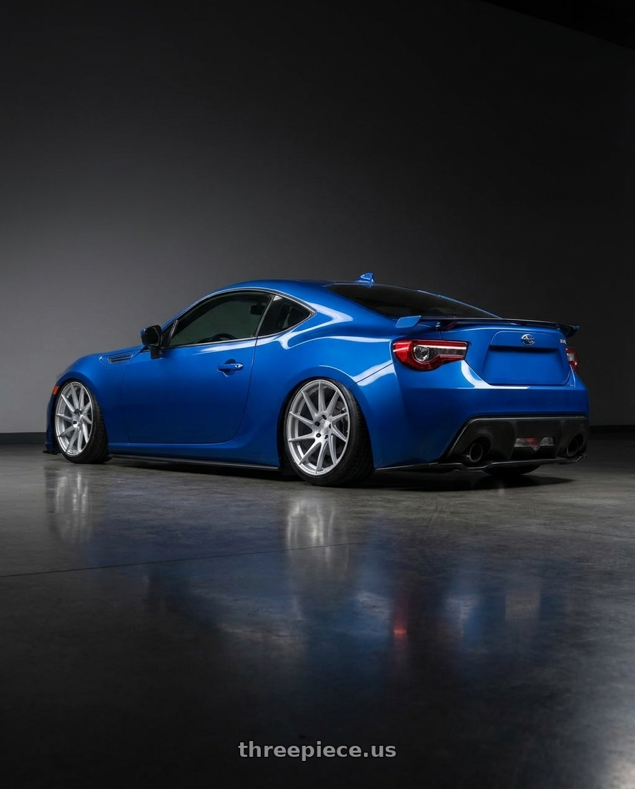 2017 Subaru BRZ with Aodhan AH09 5x100 18x8.5 +35 Gloss Silver Machined Face wheels rear three quarter view slight stretch tires
