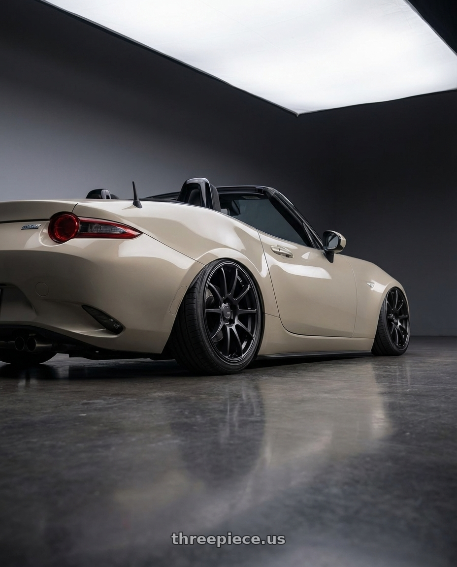 2021 Mazda MX-5 Miata ND with Ssr Gtv02 5x114.3 17x7+42  FLAT BLACK wheels rear three quarter view slight stretch tires