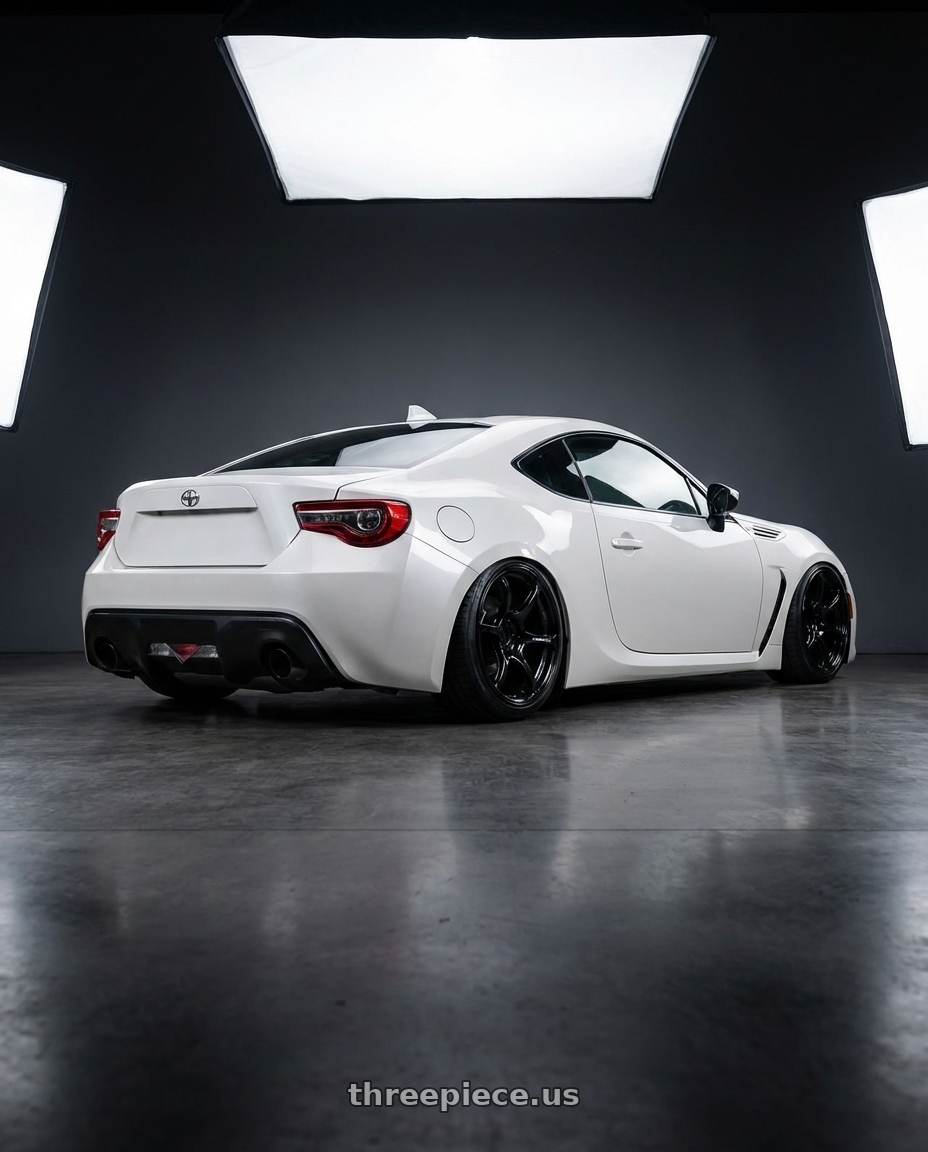 2016 Scion FR-S with Advan RGIII 5x100 18x9.5+45 Gloss Black wheels rear three quarter view slight stretch tires