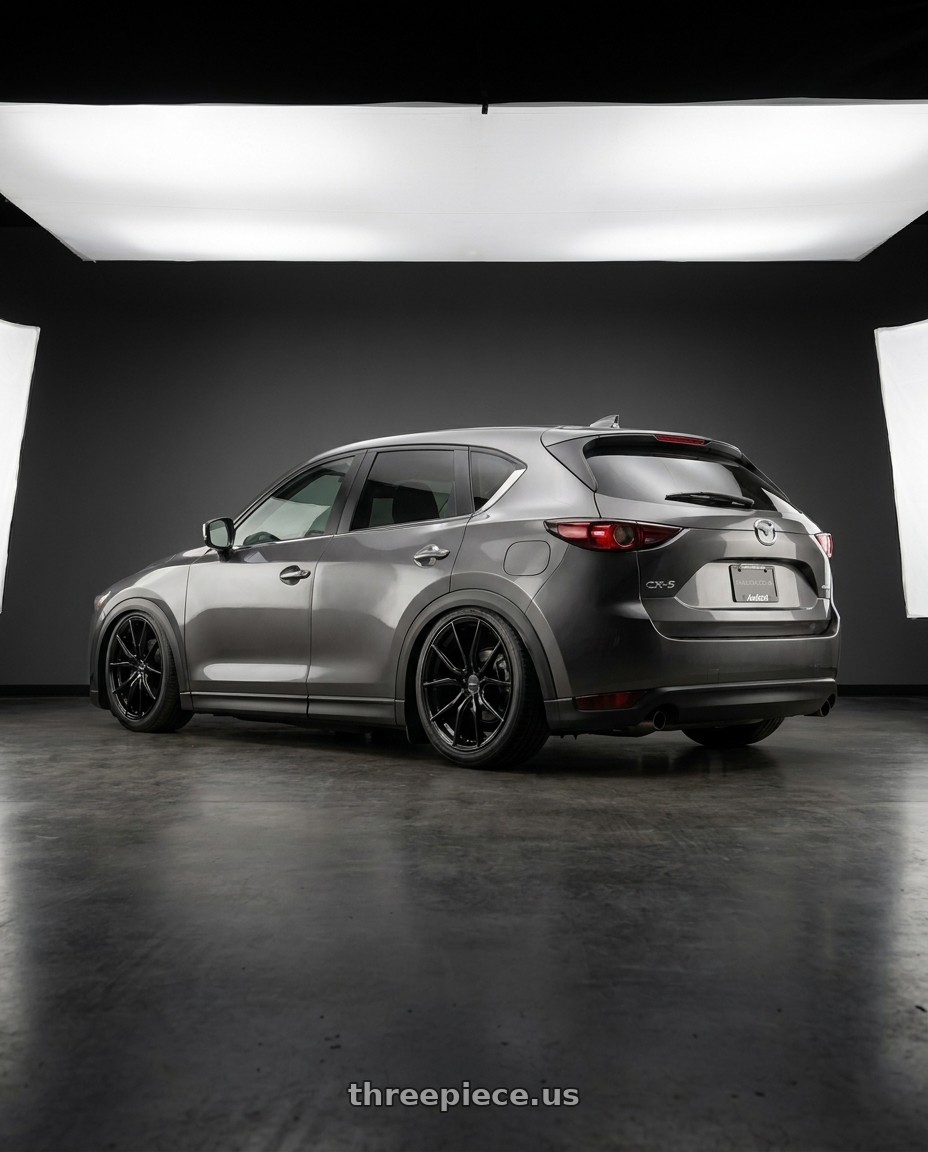 2020 Mazda Cx5 with Advanti Racing 80B Hybris 5X112 19x8.5 +35 Gloss Black wheels rear three quarter view slight stretch tires
