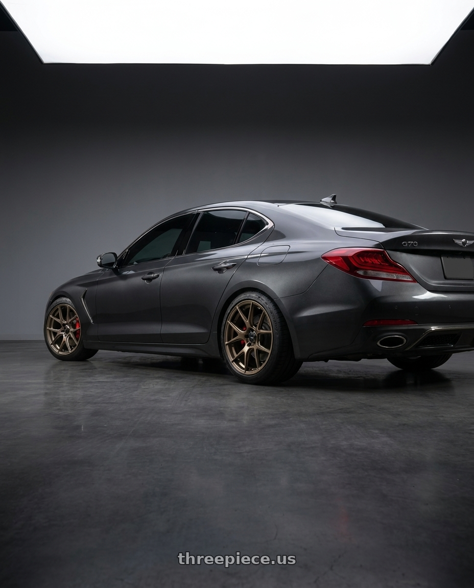 2019 Genesis G70 with Konig 56BZ Ampliform 5x114.3 17x8 +40 Gloss Bronze wheels rear three quarter view slight stretch tires
