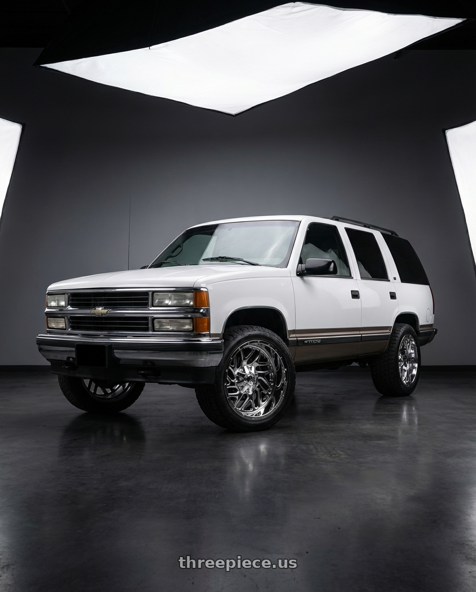 1995 chevrolet Tahoe with Fuel 2PC D210 TRITON 8X165.1 22X14 -70 CHROME PLATED wheels front three quarter view stock stance